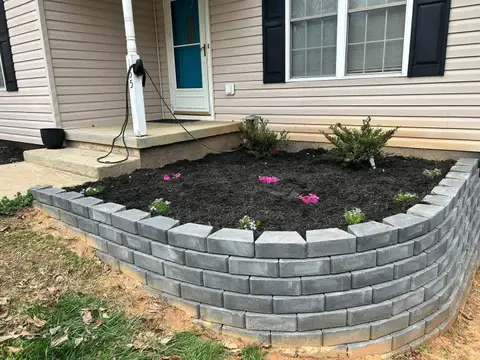 Paved walkway under construction with stones in Monroe, NC.